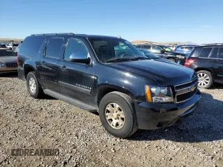 2007 Chevrolet Suburban LTZ with VIN 3GNFK16Y37G183267, listed as a Copart auction lot 79305854 with 256,147 mi miles and Salvage Title. Bid and sale history available at DreamBid. Image 4.