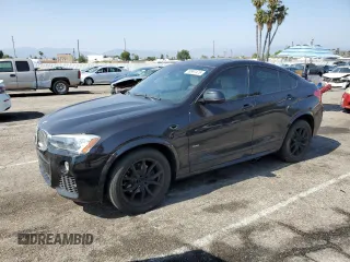 2016 BMW X4 xDrive28i with VIN 5UXXW3C50G0R23058, listed as a Copart auction lot 59997475 with 69,416 mi miles and Salvage title. Bid and sale history available at DreamBid. Image 1.