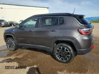 2021 Jeep Compass Trailhawk with VIN 3C4NJDDB7MT533137, listed as a Copart auction lot 56938215 with 92,507 mi miles and Salvage title. Bid and sale history available at DreamBid. Image 2.