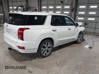 2021 Hyundai Palisade Limited z VIN KM8R5DHEXMU210597, wystawiony jako IAAI lot #41869656 z przebiegiem 56 874 mil mil oraz . Historia ofert i sprzedaży dostępna na DreamBid. Obrazek 4.