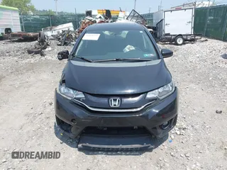 2015 Honda Fit EX-L z VIN 3HGGK5H85FM721566, wystawiony jako IAAI lot #42423777 z przebiegiem 138 825 mil mil oraz . Historia ofert i sprzedaży dostępna na DreamBid. Obrazek 13.