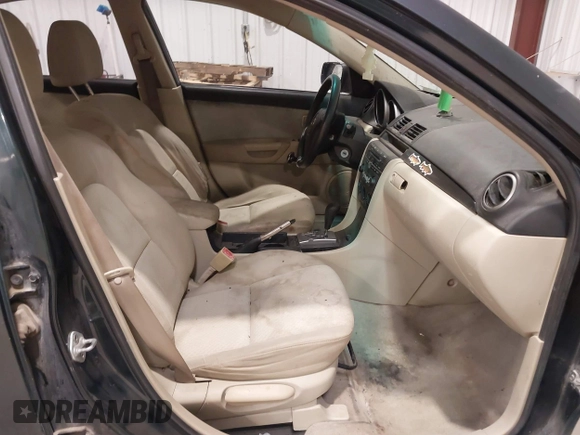 2004 Mazda 3 i with VIN JM1BK12F841139173, listed as a IAAI auction lot 40841392 with 264,821 mi miles and . Bid and sale history available at DreamBid. Image 5.