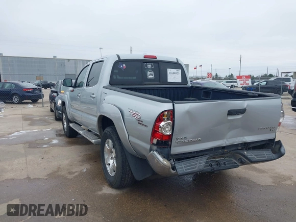 2009 Toyota Tacoma PreRunner with VIN 3TMJU62NX9M081748, listed as a IAAI auction lot 41608525 with 210,999 mi miles. Bid and sale history available at carsss.com. Image 3.