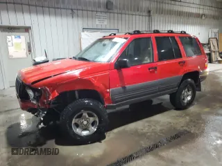 1997 Jeep Grand Cherokee Laredo with VIN 1J4GZ58Y5VC674687, listed as a Copart auction lot 43137095 with 173,228 mi miles and Salvage Title. Bid and sale history available at carsss.com. Image 1.