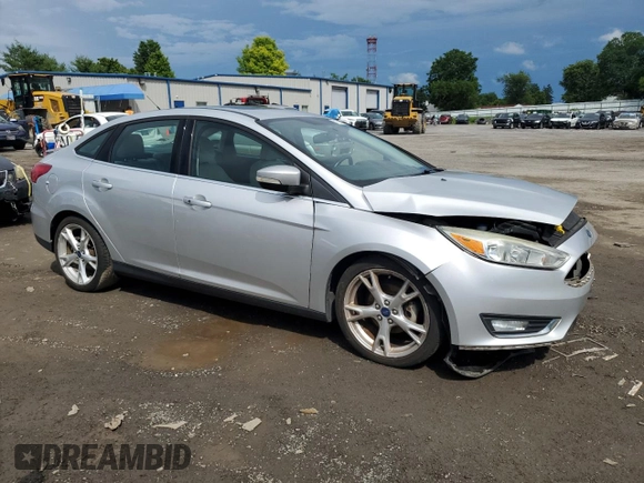 2015 Ford Focus Titanium with VIN 1FADP3J27FL285842, listed as a Copart auction lot 61159935 with 79,215 mi miles and Salvage title. Bid and sale history available at DreamBid. Image 4.