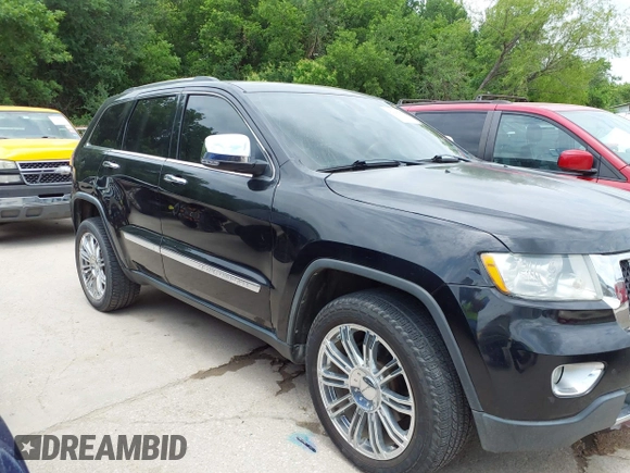 2013 Jeep Grand Cherokee Overland with VIN 1C4RJECT2DC588124, listed as a IAAI auction lot 42142573 with 204,309 mi miles and . Bid and sale history available at DreamBid. Image 13.