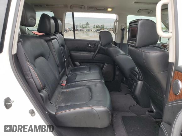 2017 Nissan Armada Platinum z VIN JN8AY2ND4H9003743, wystawiony jako Copart lot #51065965 z przebiegiem 93 801 mil mil oraz Szkoda całkowita • Salvage title. Historia ofert i sprzedaży dostępna na DreamBid. Obrazek 11.