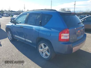 2007 Jeep Compass Limited with VIN 1J8FF57W87D409777, listed as a IAAI auction lot 41233357 with 125,019 mi miles. Bid and sale history available at carsss.com. Image 3.
