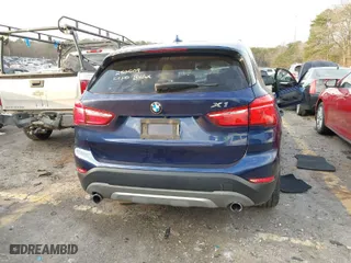 2016 BMW X1 xDrive28i with VIN WBXHT3C3XGP882221, listed as a IAAI auction lot 41581170 with 126,694 mi miles. Bid and sale history available at carsss.com. Image 16.