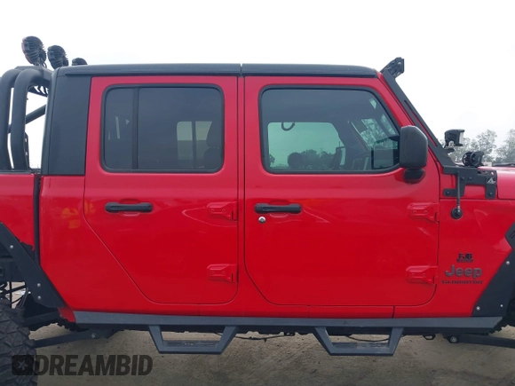 2020 Jeep Gladiator Rubicon with VIN 1C6JJTBG4LL178260, listed as a IAAI auction lot 42602460 with 61,899 mi miles and . Bid and sale history available at DreamBid. Image 13.