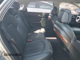 2012 Audi A8 z VIN WAURVAFDXCN001167, wystawiony jako Copart lot #57227105 z przebiegiem 154 409 mil mil oraz Szkoda całkowita • Salvage title. Historia ofert i sprzedaży dostępna na DreamBid. Obrazek 10.