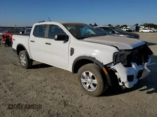 2024 Ford Ranger XL with VIN 1FTER4PH3RLE15405, listed as a Copart auction lot 72255124 with 3,994 mi miles and Salvage Title. Bid and sale history available at carsss.com. Image 4.