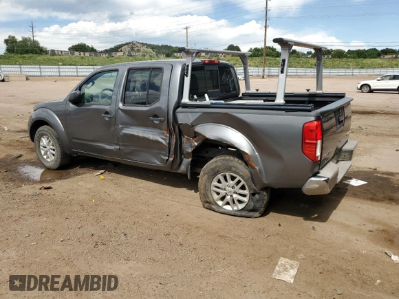 2016 Nissan Frontier Pro-4X with VIN 1N6AD0EV6GN789407, listed as a Copart auction lot 60427635 with 89,909 mi miles and Salvage title. Bid and sale history available at DreamBid. Image 2.