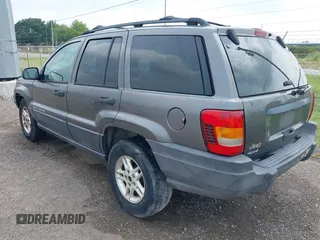 2003 Jeep Grand Cherokee Laredo with VIN 1J4GW48S83C553535, listed as a IAAI auction lot 42387097 with 360,465 mi miles and . Bid and sale history available at DreamBid. Image 3.