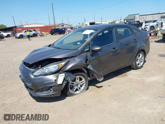 2018 Ford Fiesta SE with VIN 3FADP4BJ5JM144027, listed as a IAAI auction lot 41977656 with 34,217 mi miles. Bid and sale history available at carsss.com. Image 2.