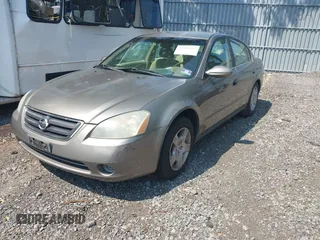 2002 Nissan Altima SL z VIN 1N4AL11D72C183312, wystawiony jako IAAI lot #42425412 z przebiegiem 167 195 mil mil oraz . Historia ofert i sprzedaży dostępna na DreamBid. Obrazek 2.