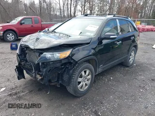 2012 Kia Sorento LX with VIN 5XYKTDA64CG259082, listed as a IAAI auction lot 42012153 with 162,383 mi miles. Bid and sale history available at carsss.com. Image 2.