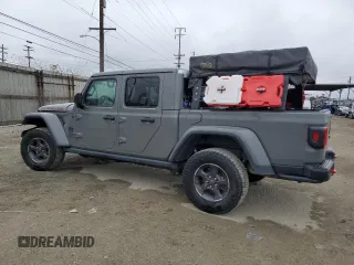 2021 Jeep Gladiator Rubicon with VIN 1C6JJTBG5ML615653, listed as a Copart auction lot 51297795 with 48,918 mi miles and Salvage title. Bid and sale history available at DreamBid. Image 2.