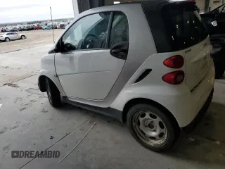 2013 Smart fortwo Pure с VIN WMEEJ3BA9DK626037, выставлен на аукционе Copart как лот 54573255 с пробегом 66 070 миль миль и Чистый • Clean title. История ставок и продаж доступна на DreamBid. Изображение 2.