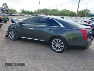 2017 Cadillac XTS Luxury with VIN 2G61M5S38H9162797, listed as a IAAI auction lot 41921355 with 74,920 mi miles and . Bid and sale history available at DreamBid. Image 3.