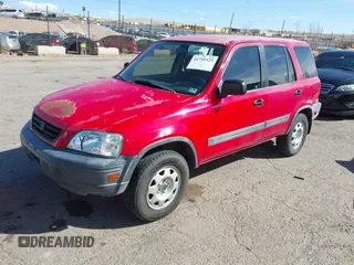 1999 Honda CR-V LX with VIN JHLRD2847XC009921, listed as a IAAI auction lot 41795325 with 268,638 mi miles. Bid and sale history available at carsss.com. Image 2.