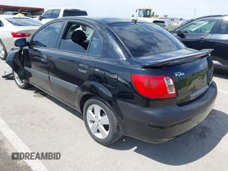 2008 Kia Rio LX with VIN KNADE123X86323641, listed as a IAAI auction lot 41985631 with 175,102 mi miles and . Bid and sale history available at DreamBid. Image 3.