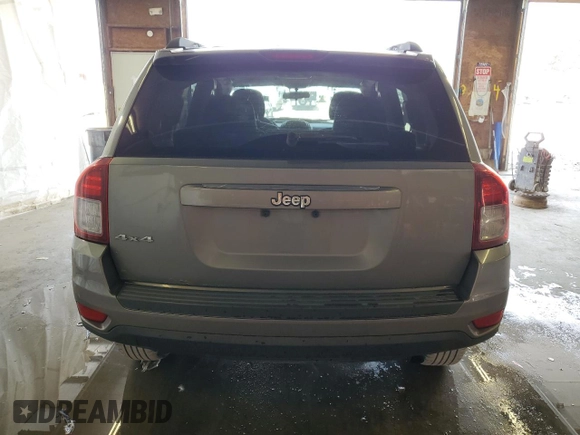 2014 Jeep Compass Sport with VIN 1C4NJDBB6ED592223, listed as a Copart auction lot 63343984 with 124,942 mi miles and Clean Title. Bid and sale history available at carsss.com. Image 6.