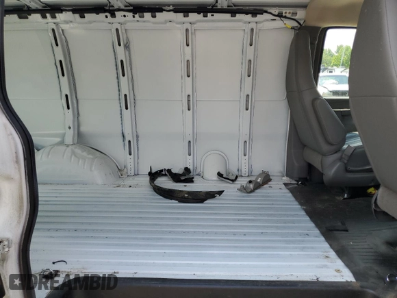 2022 Chevrolet Express Cargo z VIN 1GCWGAF71N1198508, wystawiony jako Copart lot #59487795 z przebiegiem 72 395 mil mil oraz Szkoda całkowita • Salvage title. Historia ofert i sprzedaży dostępna na DreamBid. Obrazek 11.