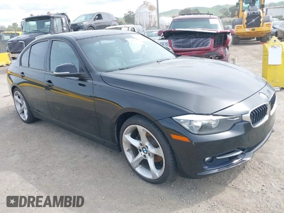 2012 BMW 3 Series 328i with VIN WBA3A5C56CF345904, listed as a IAAI auction lot 41992572 with 136,672 mi miles. Bid and sale history available at carsss.com. Image 1.