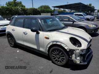 2017 MINI Hardtop 4 Door Cooper with VIN WMWXU1C32H2F77790, listed as a Copart auction lot 62352415 with 71,661 mi miles and Salvage title. Bid and sale history available at DreamBid. Image 4.