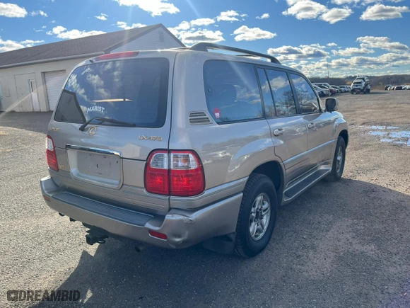 2001 Lexus LX 470 with VIN JTJHT00W013503765, listed as a Copart auction lot 80843654 with 219,615 mi miles and Clean Title. Bid and sale history available at carsss.com. Image 3.