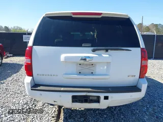 2011 Chevrolet Suburban LT with VIN 1GNSCJE05BR357775, listed as a IAAI auction lot 41807667 with 327,313 mi miles. Bid and sale history available at carsss.com. Image 16.