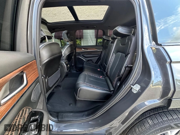 2023 Jeep Grand Cherokee Summit with VIN 1C4RJHEG2P8882566, listed as a Copart auction lot 65095905 with 59,970 mi miles and Salvage title. Bid and sale history available at DreamBid. Image 13.