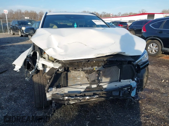 2023 Infiniti QX55 Luxe z VIN 3PCAJ5JR4PF122349, wystawiony jako IAAI lot #40942246 z przebiegiem 12 604 mil mil oraz . Historia ofert i sprzedaży dostępna na DreamBid. Obrazek 6.