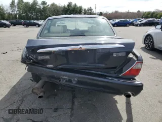 2002 Jaguar XJ 8 with VIN SAJDA14C62LF40435, listed as a Copart auction lot 52022645 with 153,703 mi miles and Salvage title. Bid and sale history available at DreamBid. Image 6.