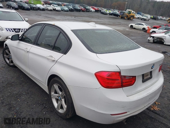 2015 BMW 3 Series 320i with VIN WBA3B1C51FP831380, listed as a IAAI auction lot 41044053 with 187,660 mi miles. Bid and sale history available at carsss.com. Image 3.