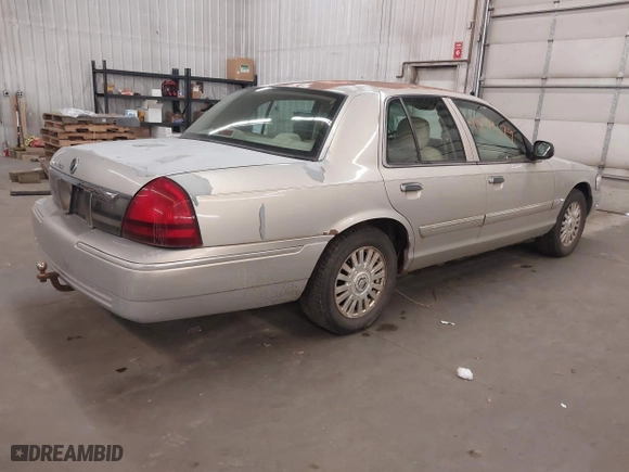 2006 Mercury Grand Marquis LS Premium with VIN 2MEFM75V86X652742, listed as a IAAI auction lot 41839679 with 212,821 mi miles. Bid and sale history available at carsss.com. Image 4.