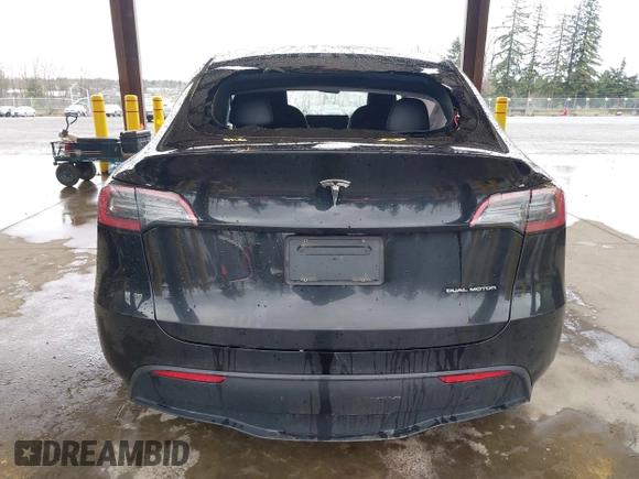 2023 Tesla Model Y Long Range with VIN 7SAYGAEE7PF739924, listed as a IAAI auction lot 41612323 with 75,226 mi miles and . Bid and sale history available at DreamBid. Image 15.