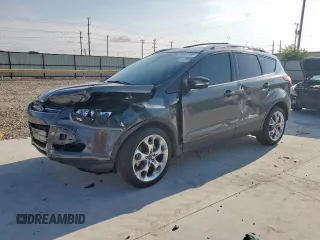 2015 Ford Escape Titanium with VIN 1FMCU0J97FUC88093, listed as a Copart auction lot 60854085 with 64,029 mi miles and Salvage title. Bid and sale history available at DreamBid. Image 1.