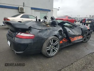 1999 Porsche 911 z VIN WP0CA2990XS651649, wystawiony jako Copart lot #45002045 z przebiegiem Nie podano mil oraz Szkoda całkowita • Salvage title. Historia ofert i sprzedaży dostępna na DreamBid. Obrazek 3.