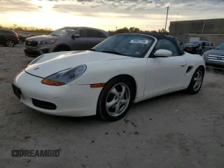 2000 Porsche Boxster z VIN WP0CA2980YU622861, wystawiony jako Copart lot #78993794 z przebiegiem 129 631 mil mil oraz Tytuł czysty. Historia ofert i sprzedaży dostępna na DreamBid. Obrazek 1.