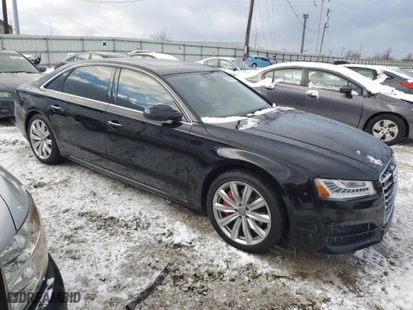 2017 Audi A8 L with VIN WAU44AFD8HN013967, listed as a Copart auction lot 87092814 with 90,880 mi miles and Salvage Title. Bid and sale history available at carsss.com. Image 4.
