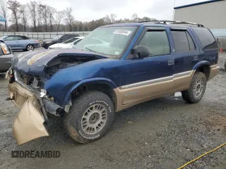 1999 GMC Jimmy SLE with VIN 1GKDT13W8X2545509, listed as a Copart auction lot 81608944 with 130,881 mi miles and Salvage Title. Bid and sale history available at carsss.com. Image 1.