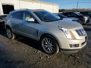 2014 Cadillac SRX Premium Collection z VIN 3GYFNGE34ES687663, wystawiony jako Copart lot #85854534 z przebiegiem 193 653 mil mil oraz Szkody całkowita. Historia ofert i sprzedaży dostępna na DreamBid. Obrazek 4.