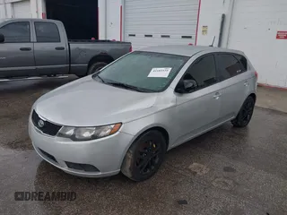2011 Kia Forte EX z VIN KNAFU5A2XB5322692, wystawiony jako IAAI lot #42185939 z przebiegiem 180 432 mil mil oraz . Historia ofert i sprzedaży dostępna na DreamBid. Obrazek 2.