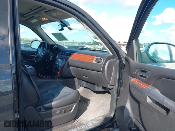 2012 Chevrolet Tahoe LTZ with VIN 1GNSKCE04CR218348, listed as a IAAI auction lot 41541342 with 96,365 mi miles and . Bid and sale history available at DreamBid. Image 5.