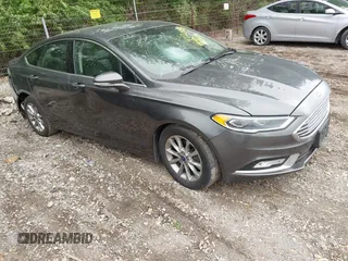 2017 Ford Fusion SE with VIN 3FA6P0HD3HR335350, listed as a IAAI auction lot 42201095 with 165,101 mi miles and . Bid and sale history available at DreamBid. Image 1.