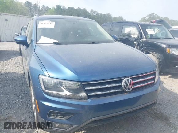 2018 Volkswagen Tiguan S with VIN 3VV0B7AXXJM018455, listed as a IAAI auction lot 41979115 with 92,104 mi miles and . Bid and sale history available at DreamBid. Image 6.
