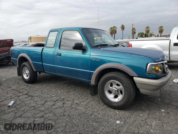 1997 Ford Ranger XLT with VIN 1FTCR15X0VPB28557, listed as a Copart auction lot 81848864 with 137,598 mi miles and Salvage Title. Bid and sale history available at DreamBid. Image 4.