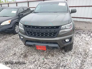 2018 Chevrolet Colorado 4WD LT z VIN 1GCGTCEN2J1235085, wystawiony jako IAAI lot #42192629 z przebiegiem 83 914 mil mil oraz . Historia ofert i sprzedaży dostępna na DreamBid. Obrazek 12.